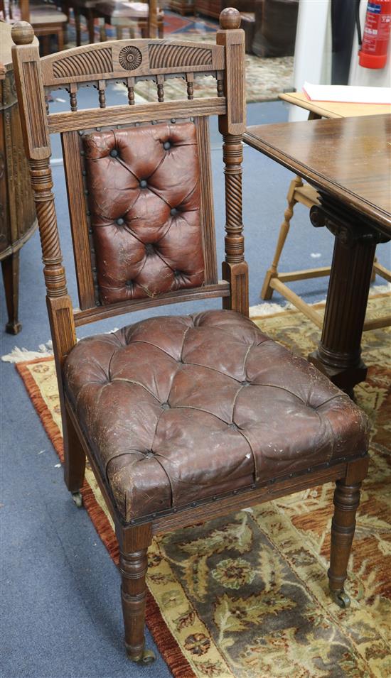 Six leather button back dining chairs